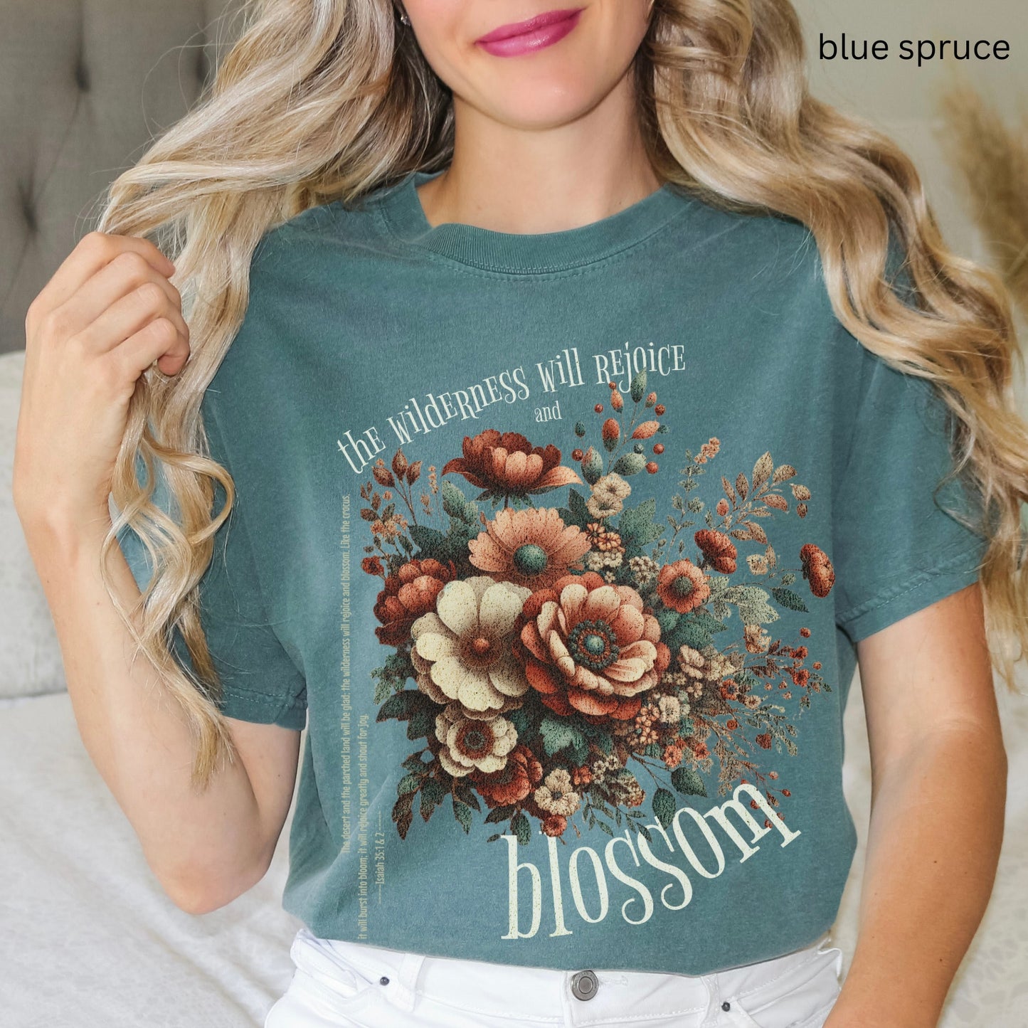 Christian t-shirt with boho design and Bible verse saying the wilderness will blossom in Comfort Colors blue spruce color